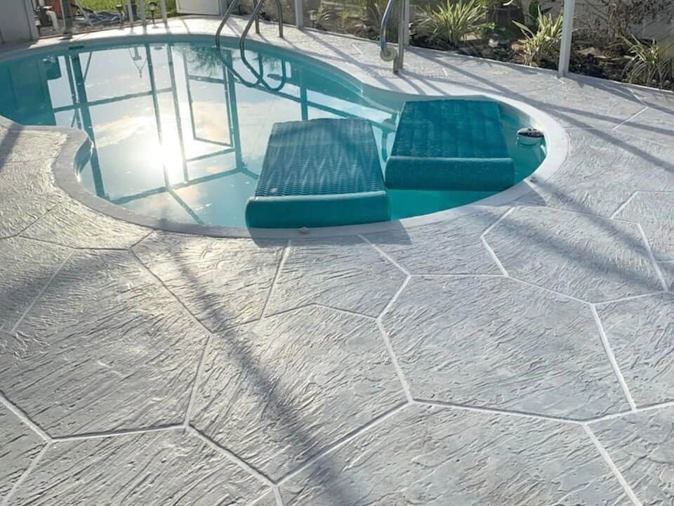 pooldeck resurfacing with concrete overlay
